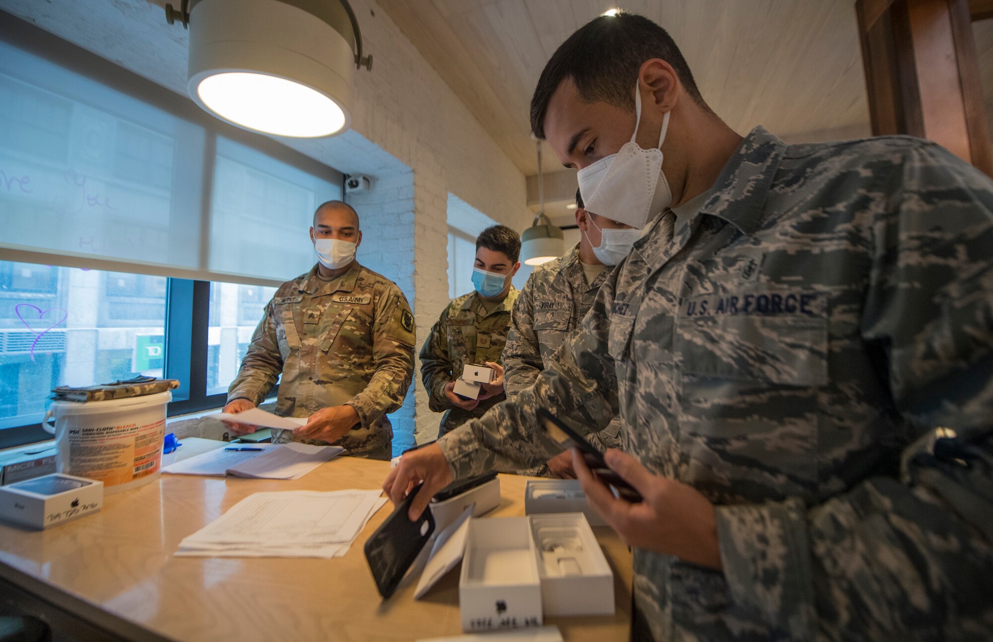 Photo of Airmen packing Joint All-Domain Command and Control devices.