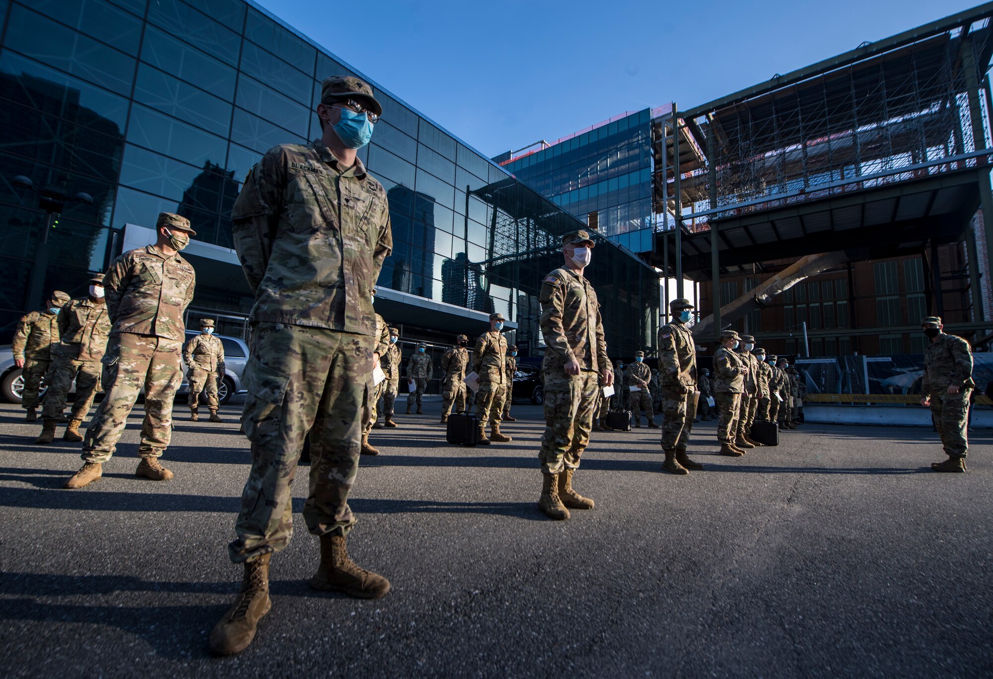 CRW Airmen aid Reserve medics in formation to receive certificates.