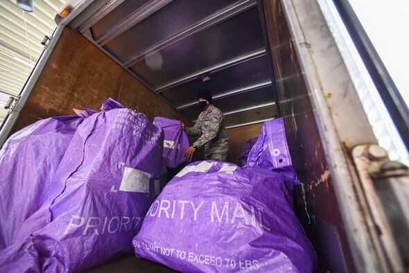 The 35th Logistics Readiness Squadron ground transportation team and the 35th Force Support Squadron post office join forces to ensure mail operations continue through COVID-19 at Misawa Air Base, Japan.