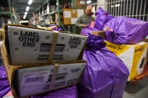 The 35th Logistics Readiness Squadron ground transportation team and the 35th Force Support Squadron post office join forces to ensure mail operations continue through COVID-19 at Misawa Air Base, Japan.