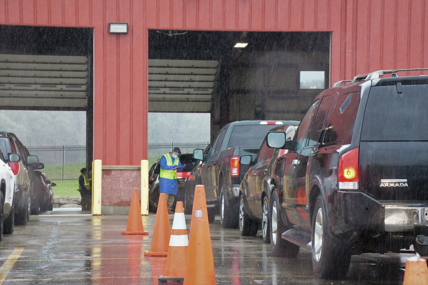 Citizen-Soldiers and -Airmen from the Wisconsin National Guard collect specimens for COVID-19 testing May 18, 2020, at Menominee Department of Transit Services in Keshena.
