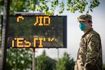 A West Virginia National Guard Soldier waits for people to arrive to be tested for COVID-19 on May 22, 2020, in Charleston, W.Va.