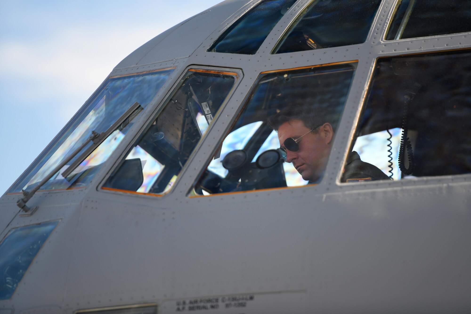 Maj. Nathan Eldredge, 62nd Airlift Squadron instructor pilot, completes pre-flight checks on a C-130J Super Hercules at Little Rock Air Force Base, Arkansas.
