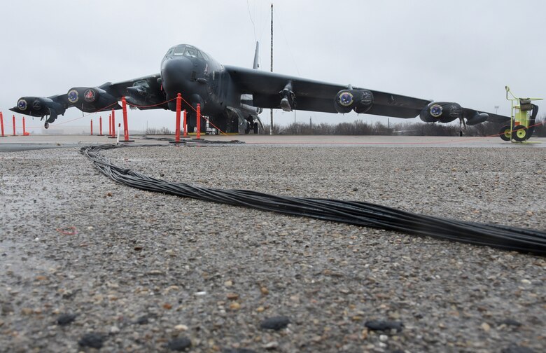 Fiber optic cables performing the low-level continuous wave testing are affixed to hundreds of strategic points throughout a 2nd Bomb Wing B-52H Stratofortress. The cables travel from the wing tips through the fuselage, allowing data of pulse absorption at those points to be sent for analysis. (U.S. Air Force photo/Kelly White)