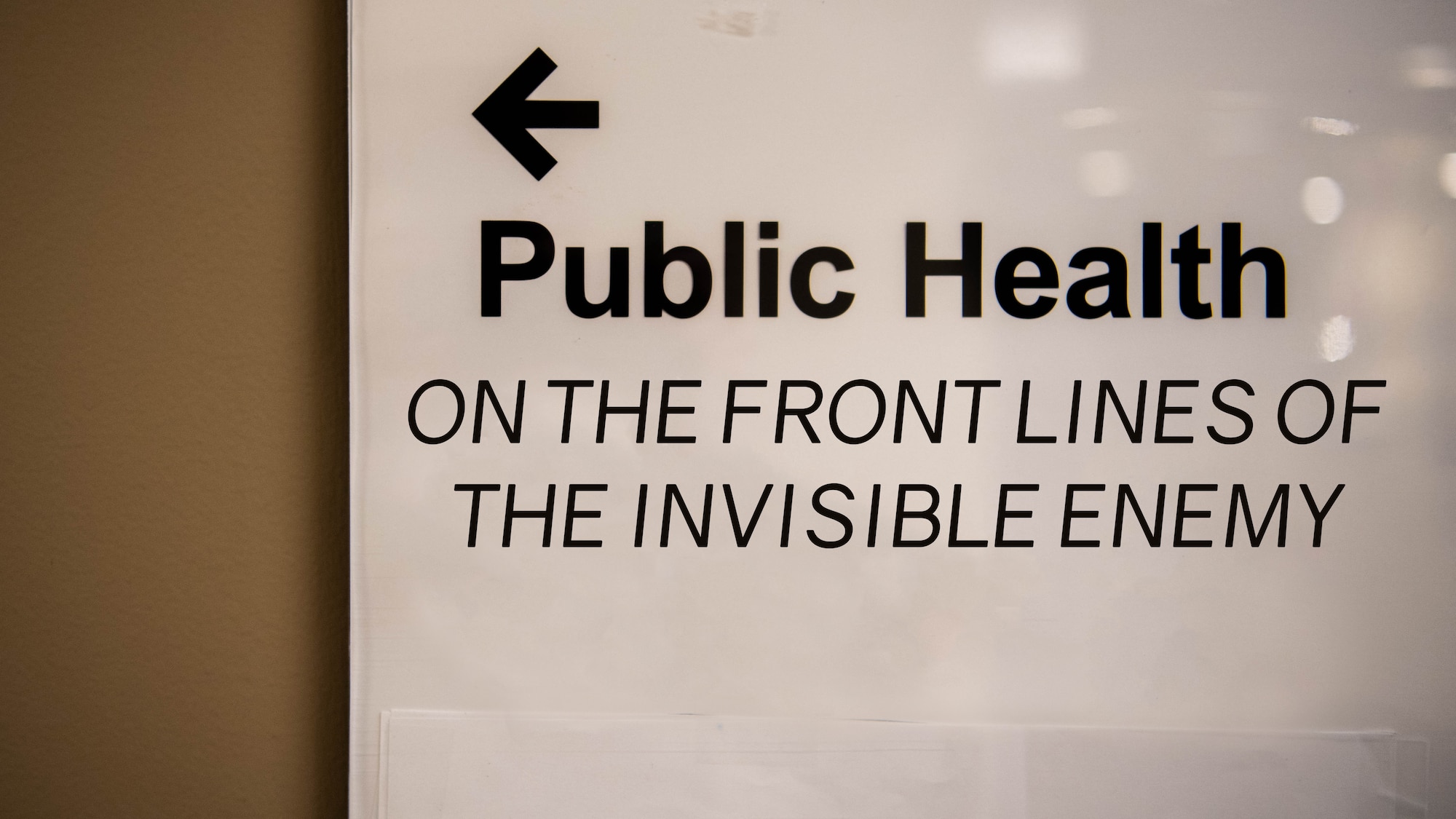 A sign shows the way to the 2nd Medical Group public health unit at Barksdale Air Force Base, La, May 29, 2020. (U.S. Air Force graphic by Airman 1st Class Jacob B. Wrightsman)