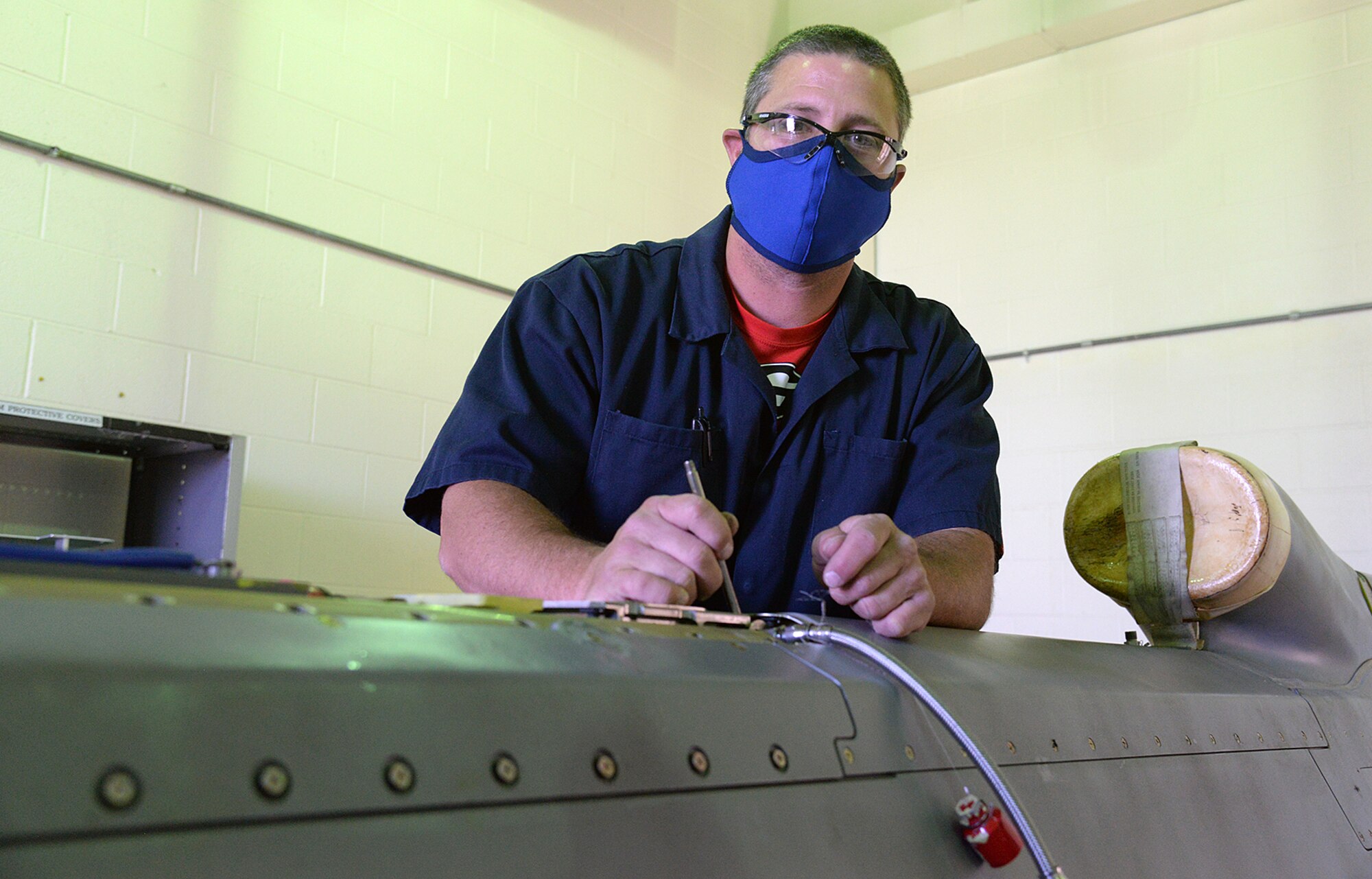 582 Missile Maintenance Squadron liquid engine rocket fuel mechanic, Rodney Glover, inspects an AGM-86B Air Launched Cruise Missile while it is being refueled on Apr. 28, 2020, at Hill Air Force Base, Utah.