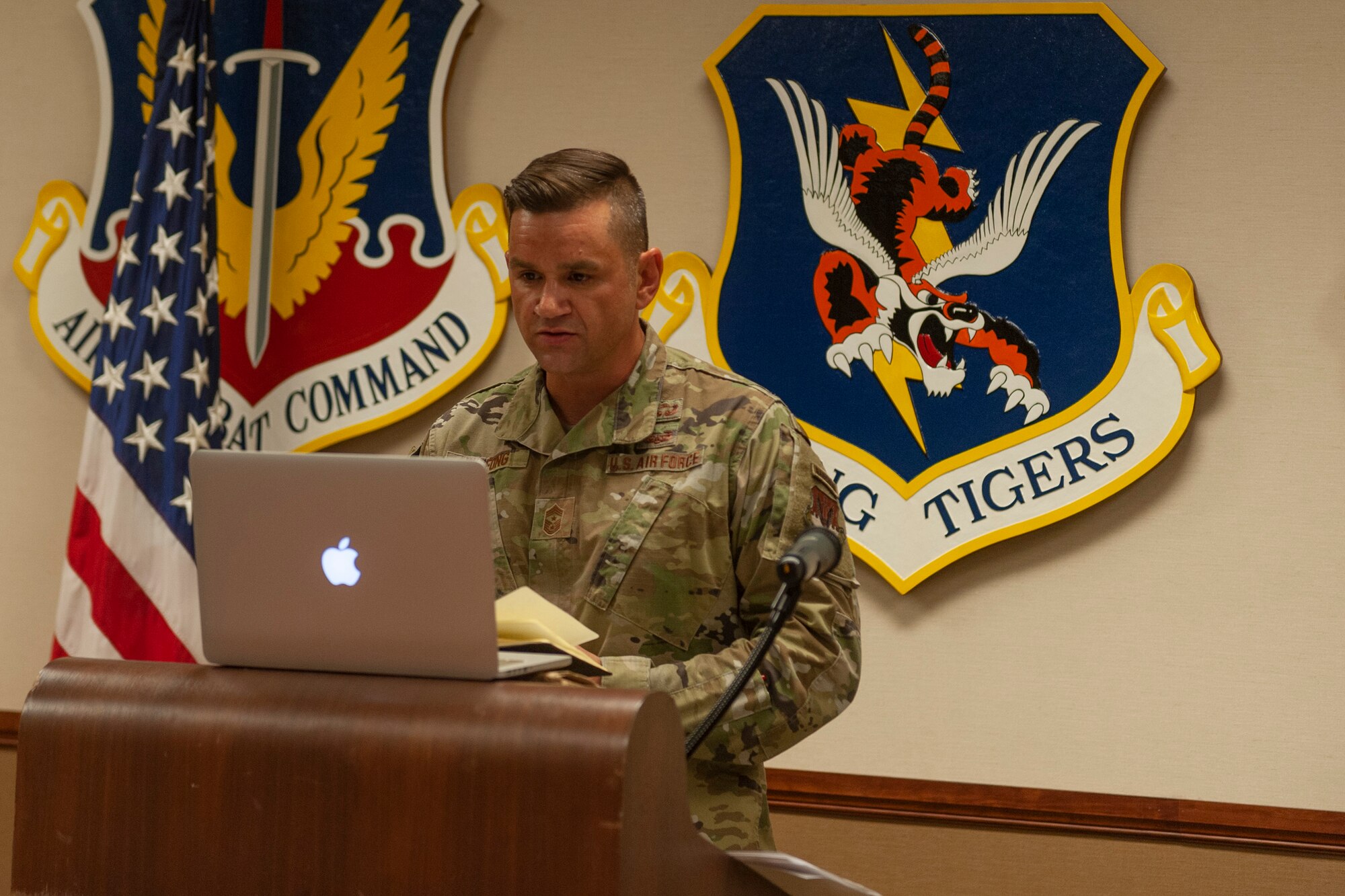 Photo of Chief Wilfong thanking Airmen