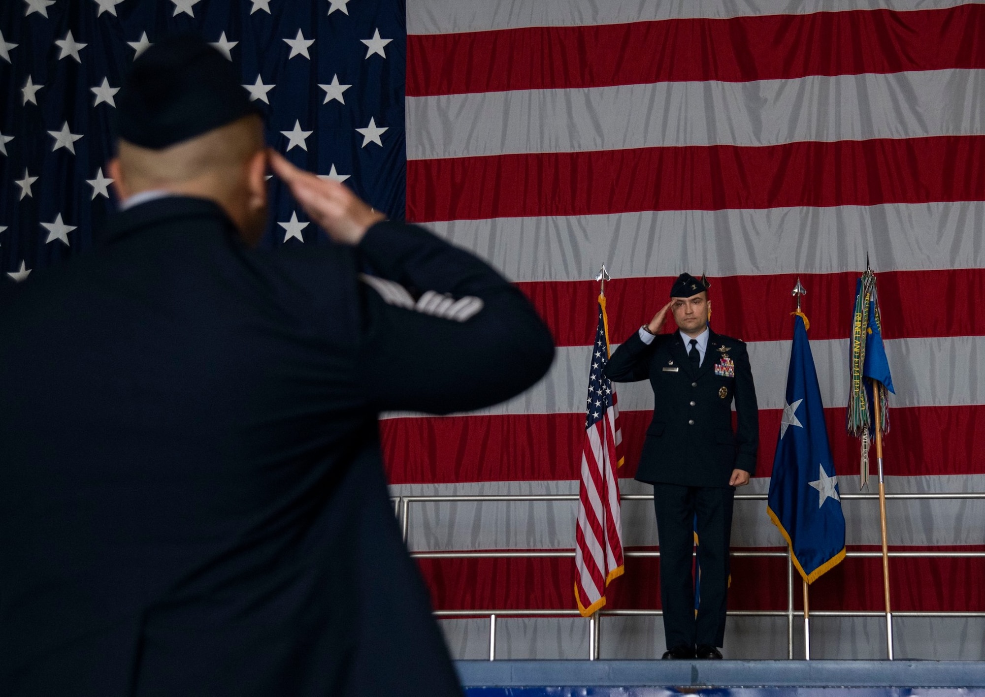 Leadership stands on stage