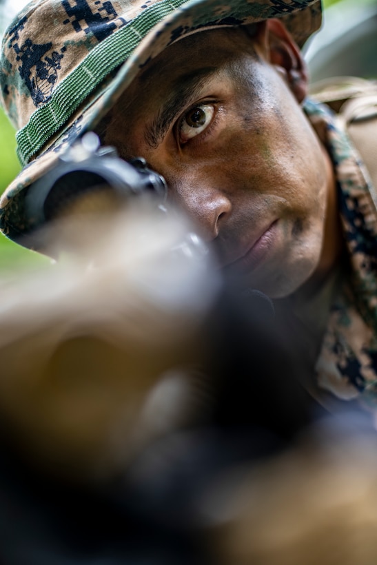 Sgt. Daniel Cardiel, a military policeman with Special Purpose Marine Air-Ground Task Force - Southern Command, provides security during a field exercise at Camp Lejeune, North Carolina, May 6, 2020. These training events assist the Marines and Sailors when working alongside partner nations in Latin America and the Caribbean with crisis response preparedness, security cooperation training, and engineering projects. Cardiel is a native of Riverside, California. (U.S. Marine Corps photo by Sgt. Andy O. Martinez)