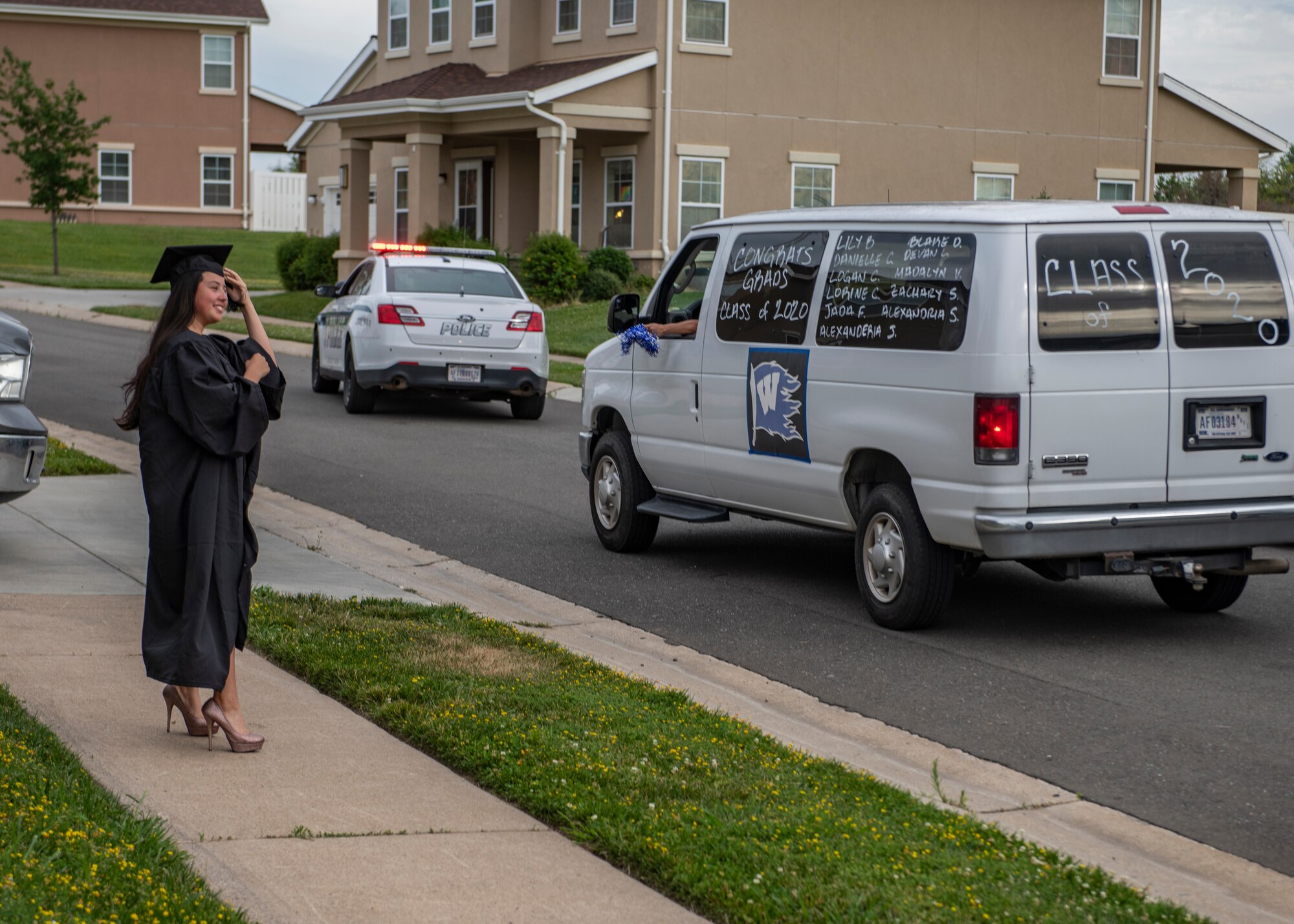 One of Beale’s 2020 high school graduates observes a parade on Beale Air Force Base.