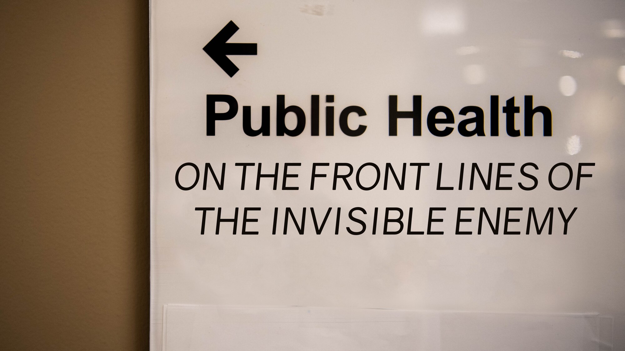 A sign shows the way to the 2nd Medical Group public health unit at Barksdale Air Force Base, La, May 29, 2020. (U.S. Air Force graphic by Airman 1st Class Jacob B. Wrightsman)