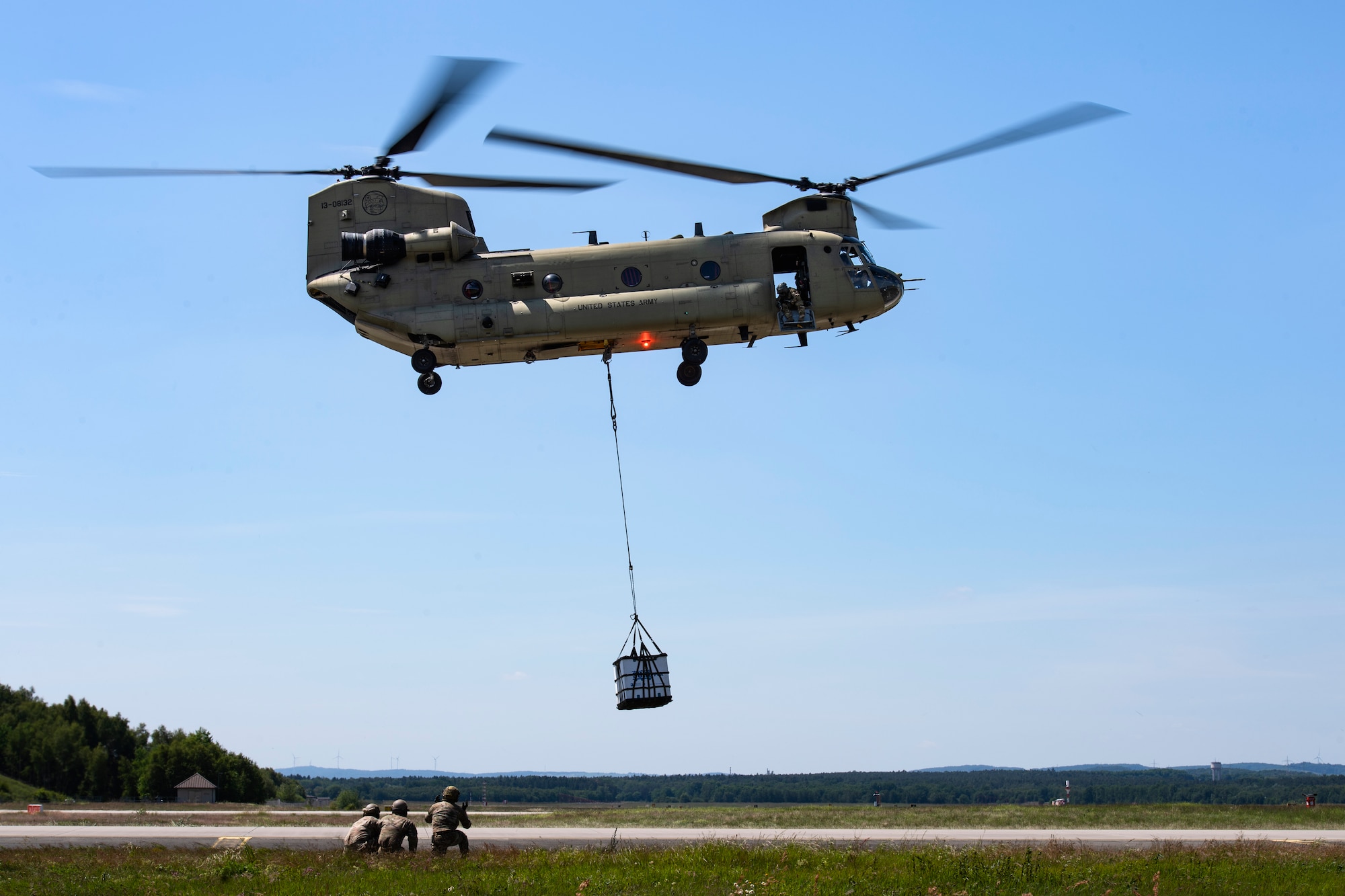 Photo of helicopter lifting cargo