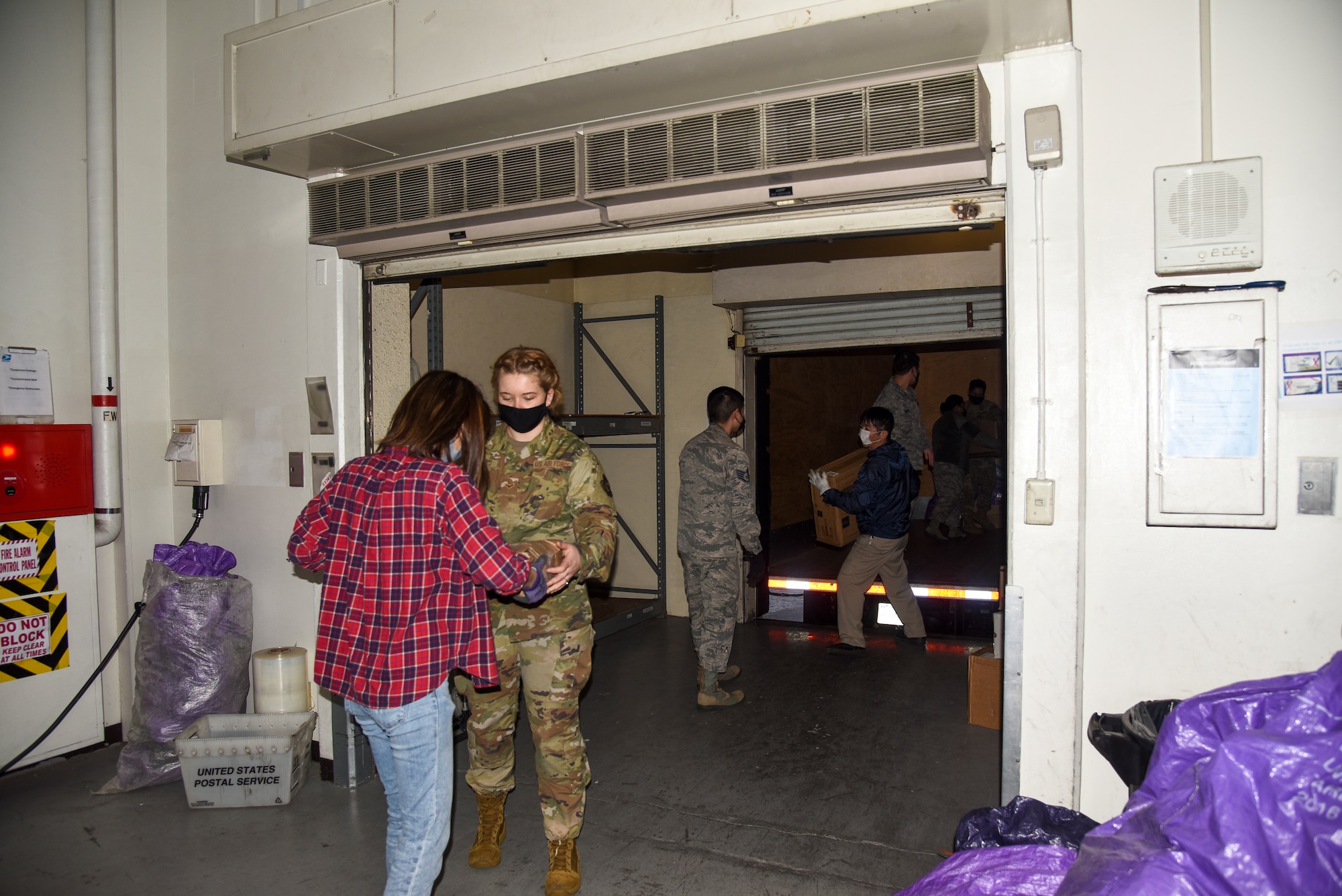 The 35th Logistics Readiness Squadron ground transportation team and the 35th Force Support Squadron post office join forces to ensure mail operations continue through COVID-19 at Misawa Air Base, Japan.
