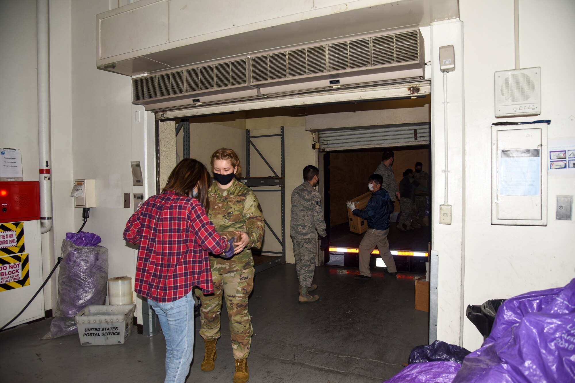 The 35th Logistics Readiness Squadron ground transportation team and the 35th Force Support Squadron post office join forces to ensure mail operations continue through COVID-19 at Misawa Air Base, Japan.