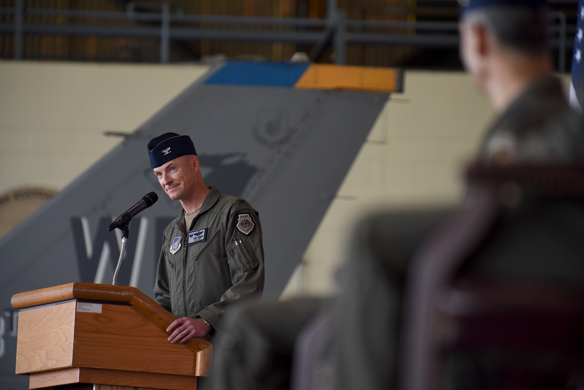 Col. Christopher Hammond, 8th Fighter Wing commander, speaks to members of the Wolf Pack during the 8th FW change of command ceremony at Kunsan Air Base, Republic of Korea, June 2, 2020. As Wolf 60, Hammond is responsible for more than 2,700 active-duty personnel, four groups and 13 squadrons, including two F-16 squadrons tasked with supporting 7th Air Force operational readiness. (U.S. Air Force photo by Staff Sgt. Mackenzie Mendez)