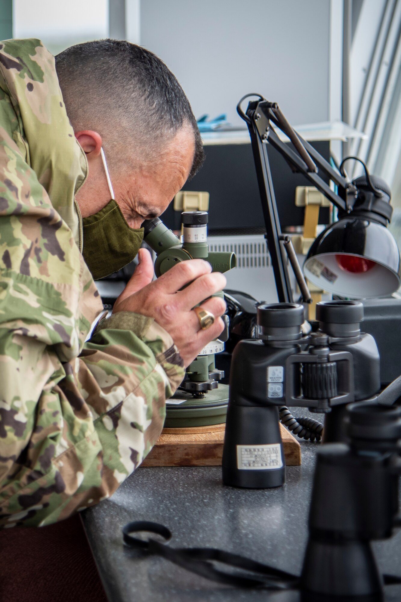 U.S. Air Force Chief Master Sgt. John Alsvig, the 35th Fighter Wing command chief, looks into a M2A2 aiming scope at Draughon Range near Misawa Air Base, Japan, May 20, 2020. The M2A2 aiming scope is the back-up scoring system for air-to-ground weapons employment for aircraft such as the F-16 Fighting Falcon and Japan Air Self-Defense Force F-35. These jets use the range to enhance the training and readiness of Misawa’s fighter pilots, ensuring Team Misawa maintains its combat readiness and continues its mission of defending Japan and protecting U.S. interests in the Pacific. (U.S. Air Force photo by Airman 1st Class China M. Shock)