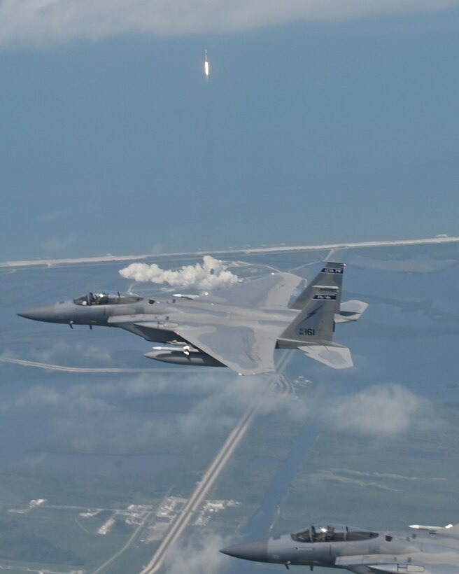 Florida Air National Guard F-15s from the 125th Fighter Wing, Jacksonville, Florida, conducted a North American Aerospace Defense Command (NORAD) mission, defending the skies over the Kennedy Space Center during the first manned space launch in nearly nine years, Cape Canaveral, Florida, May 30, 2020.