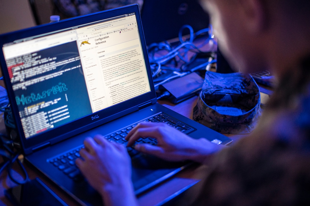 U.S. Marine analyzes and collects data at a computer station during a DCO training event at Marine Corps Base Camp Pendleton, California, May 19.