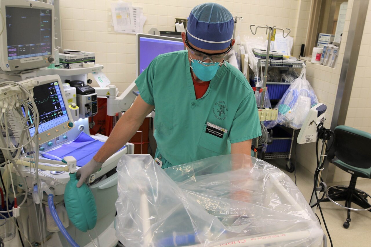 An Army medical officer demonstrates how to use a CAMIC.