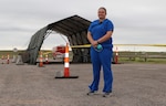 Spc. Kristyn Harding, combat medic, 1077th Ground Ambulance Company, Kansas Army National Guard, came to the rescue of a child having difficulty breathing at a COVID-19 drive-thru testing site in Dodge City May 19, 2020. She is shown at the site on May 23.