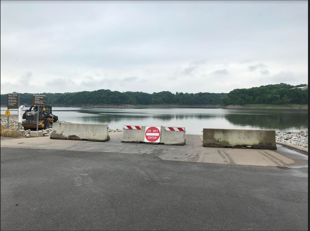 Barricades block access to the West Overlook Day Use Boat Ramp at Coralville Lake.