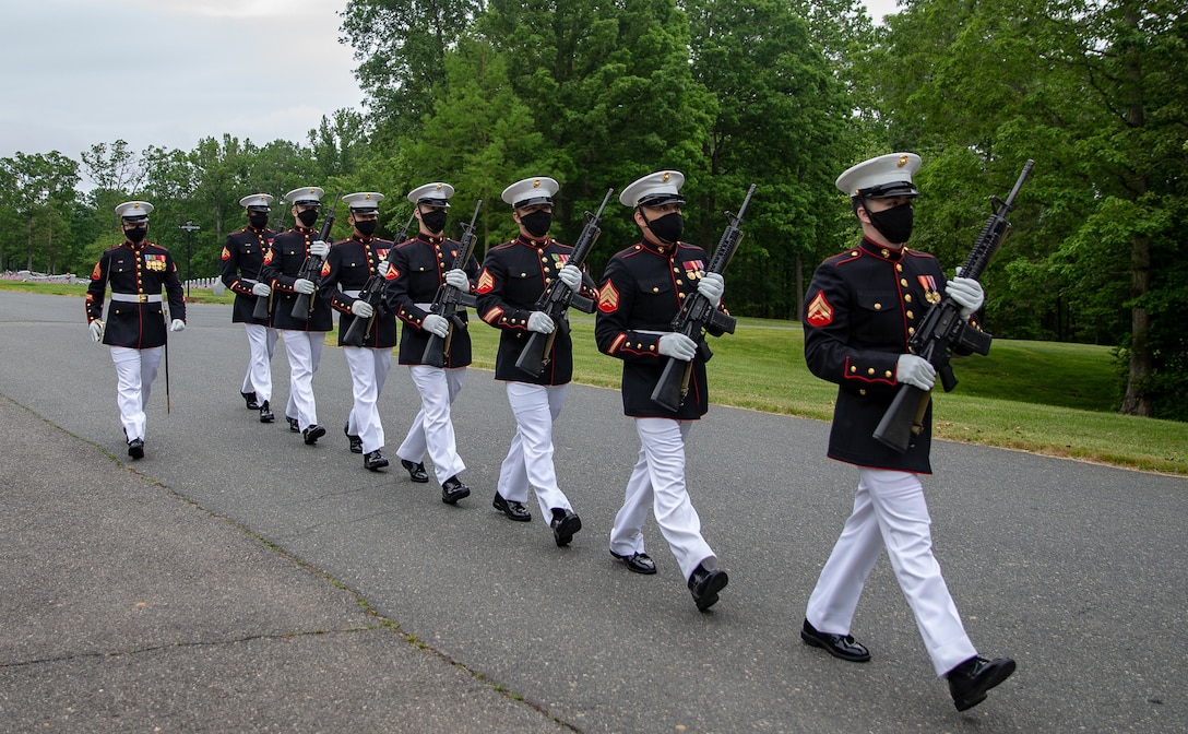 U.S. Marines with Headquarters and Service Battalion conduct a Memorial Day Ceremony at the Quantico National Cemetery, Triangle, Va., May 25.