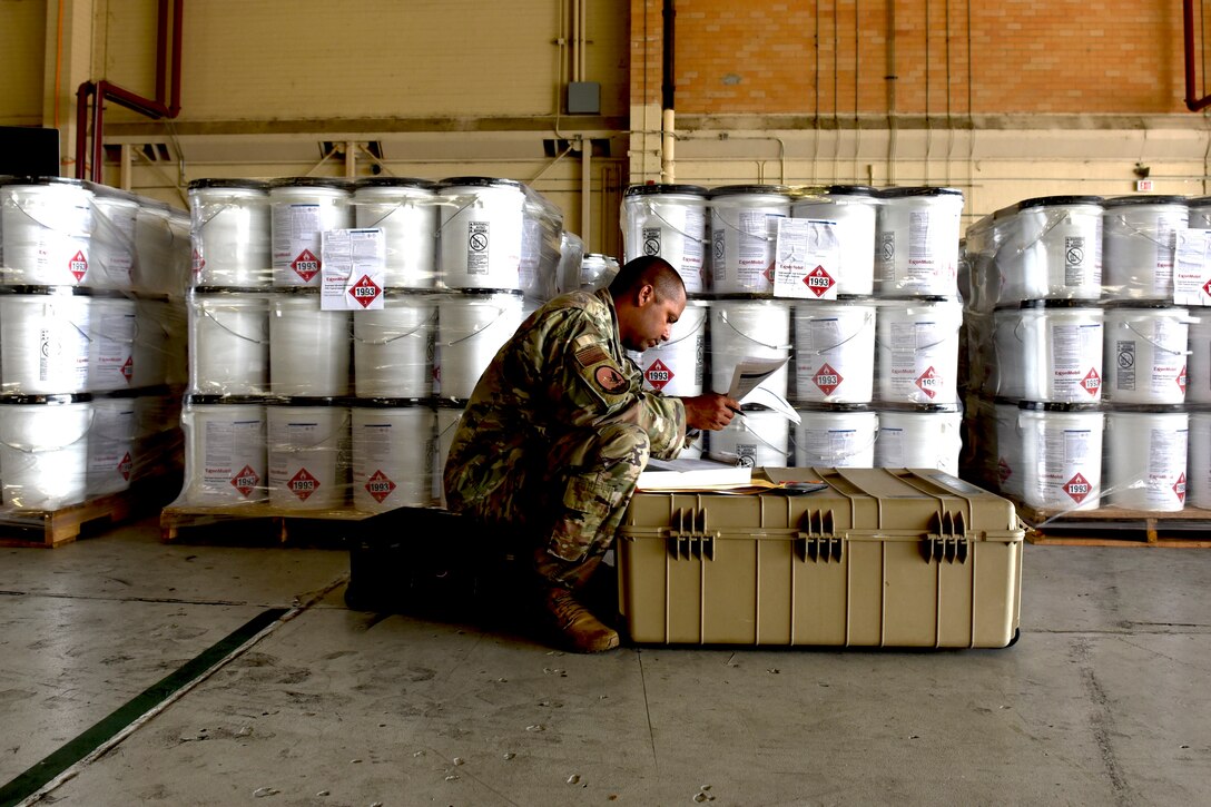 Photo of Airman checking hazmat documentation
