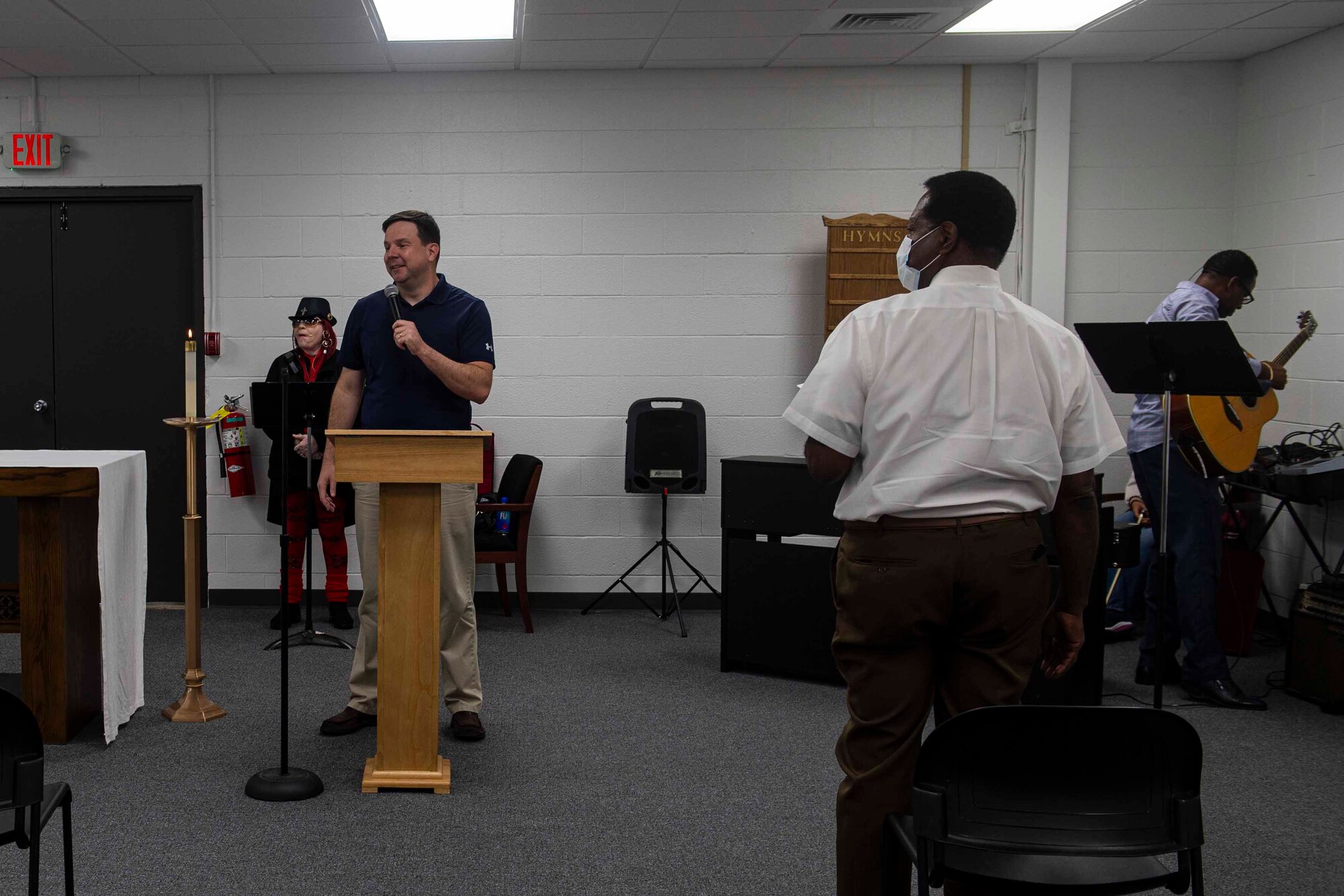Photo of a chaplain speaking during service.