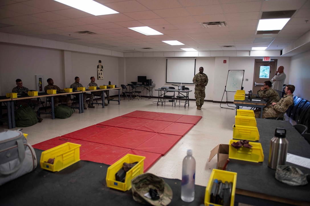 Photo of an Airman teaching a course.