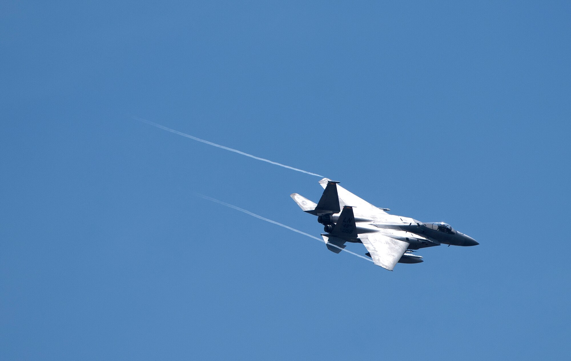 An F-15C Eagle assigned to the 493rd Fighter Squadron flies over Royal Air Force Lakenheath, England, June 2, 2020. The Eagle's air superiority is achieved through a mixture of unprecedented maneuverability and acceleration, range, weapons and avionics. (U.S. Air Force photo by Airman 1st Class Jessi Monte)