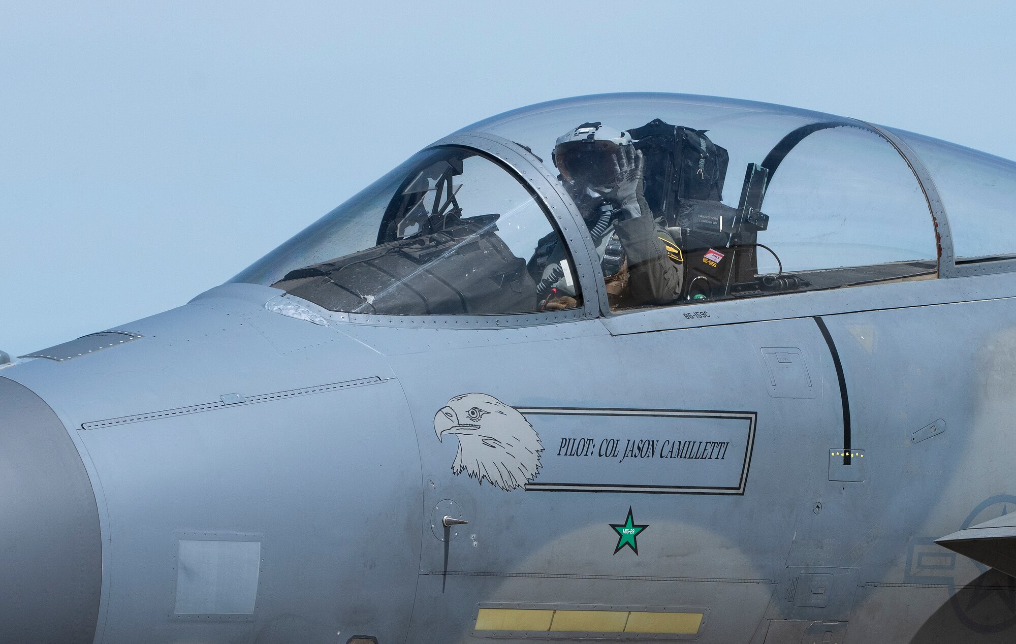 A 493rd Fighter Squadron pilot waves as he taxis an F-15C Eagle at Royal Air Force Lakenheath, England, June 2, 2020. The 493rd FS conducts routine training to ensure the Liberty Wing remains combat ready in support of U.S. Air Forces in Europe-Air Forces Africa. (U.S. Air Force photo by Airman 1st Class Jessi Monte)