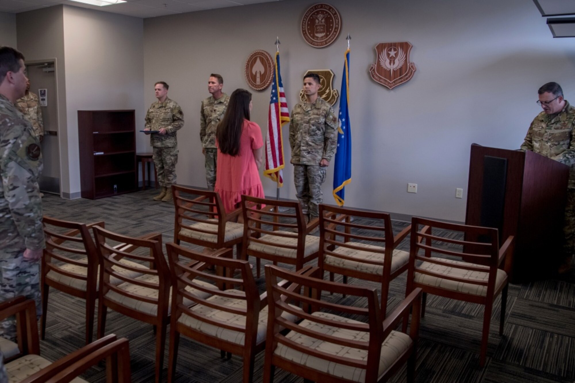 Members of the 720th Special Tactics Group watch as Staff Sgt. Johnathan Randall, Special Operations Surgical Team member assigned to the 720th Operational Support Squadron, is presented a Bronze Star Medal during a ceremony