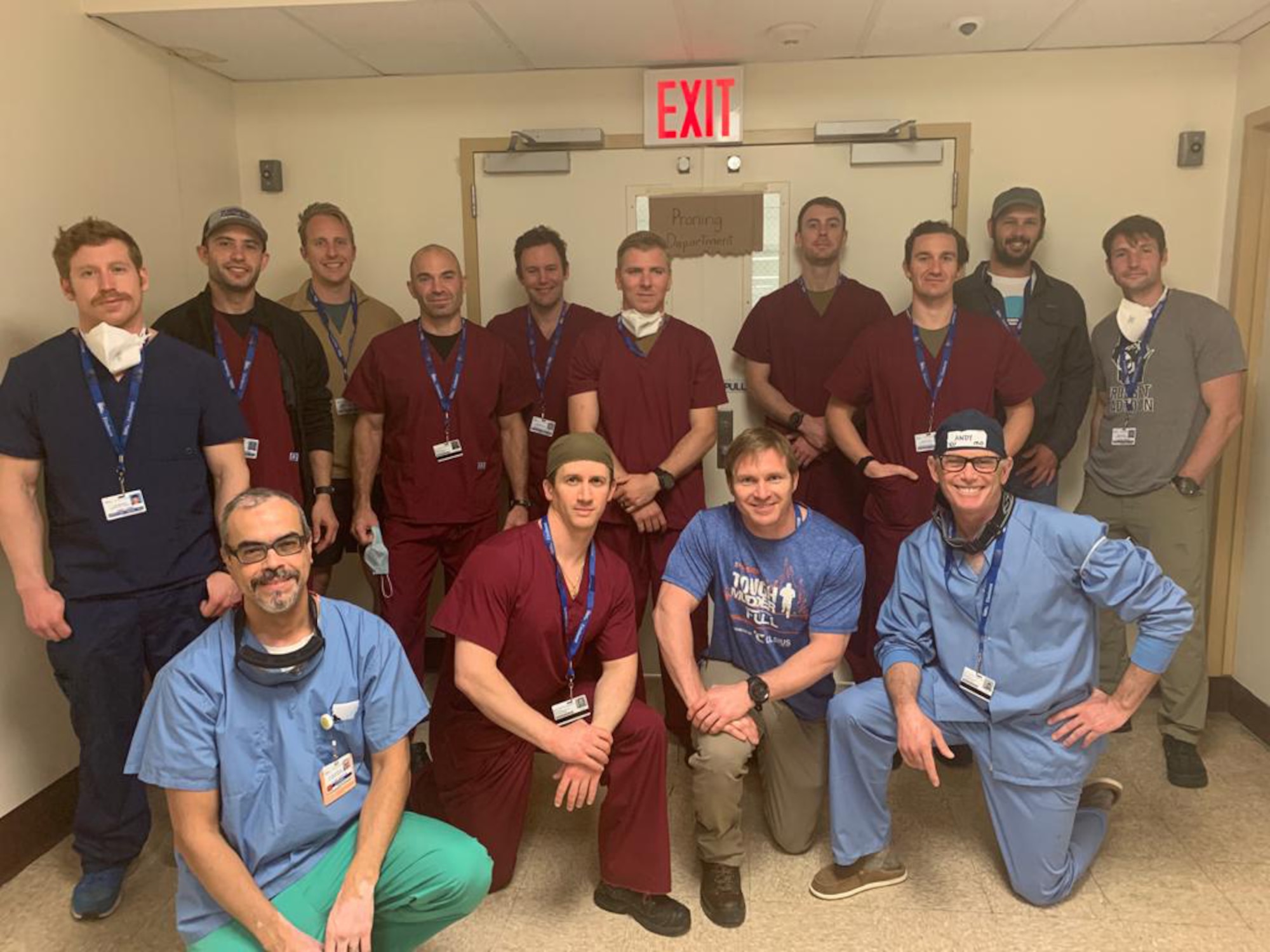 Pararescue Airmen assigned to the 103rd Rescue Squadron of the New York Air National Guard's 106th Rescue Wing who assisted medical staff at Elmhurst Hospital in Queens, N.Y., during the COVID-19 pandemic, with members of the hospital staff.
