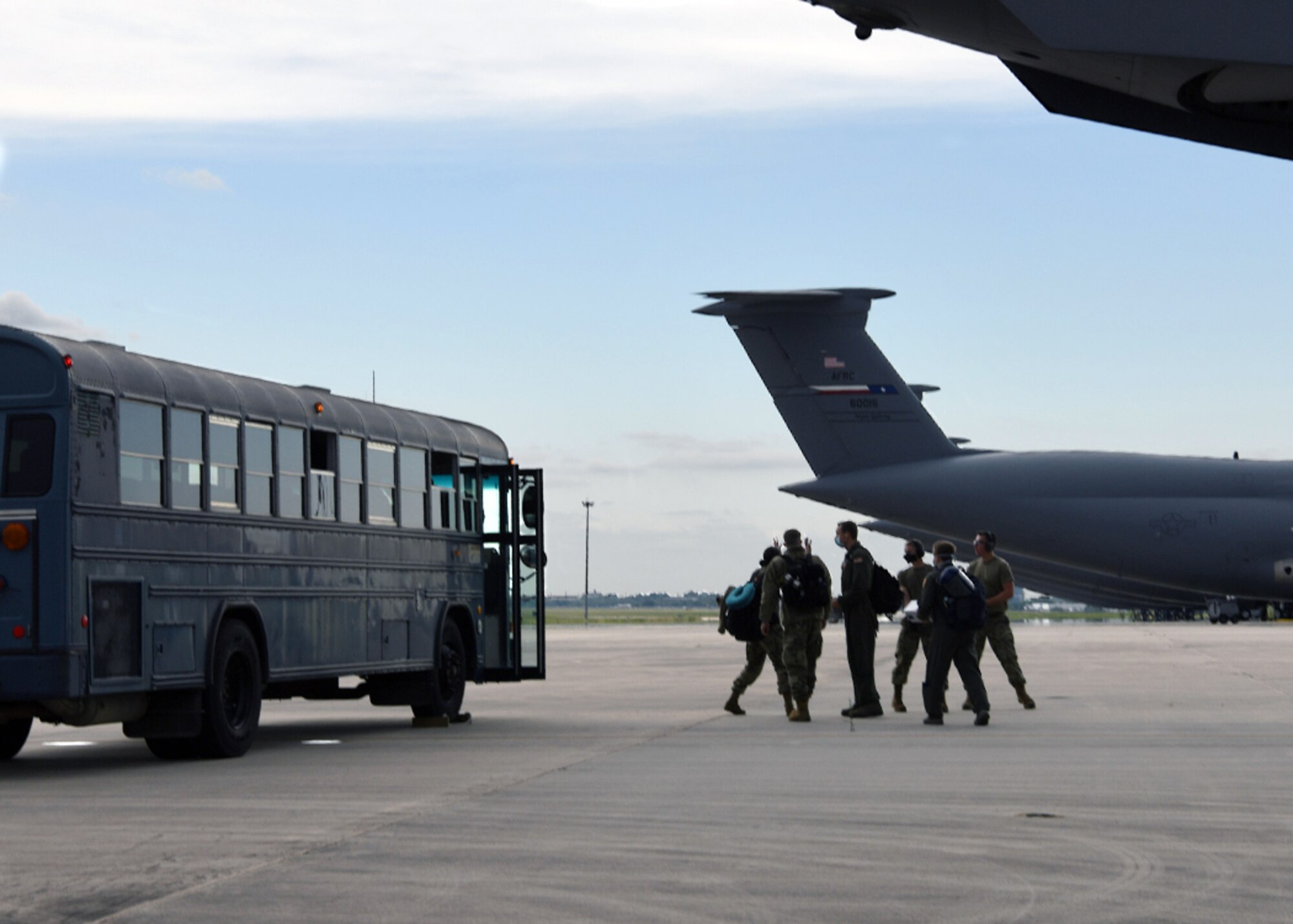 Reserve Citizen Airmen from the 433rd Medical Group celebrate after returning home from a deployment to New York City, May 28, 2020 at Joint Base San Antonio-Lackland, Texas.