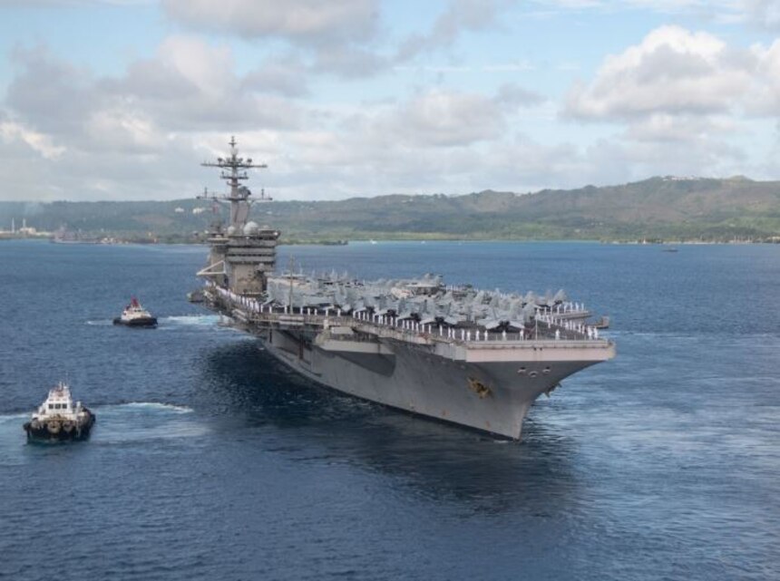 PHILIPPINE SEA (June 4, 2020) The aircraft carrier USS Theodore Roosevelt (CVN 71) departs Apra Harbor July 4, 2020. Following an extended visit to Guam in the midst of the COVID-19 global pandemic, Theodore Roosevelt is returning to operational tasking during a deployment to the Indo-Pacific.