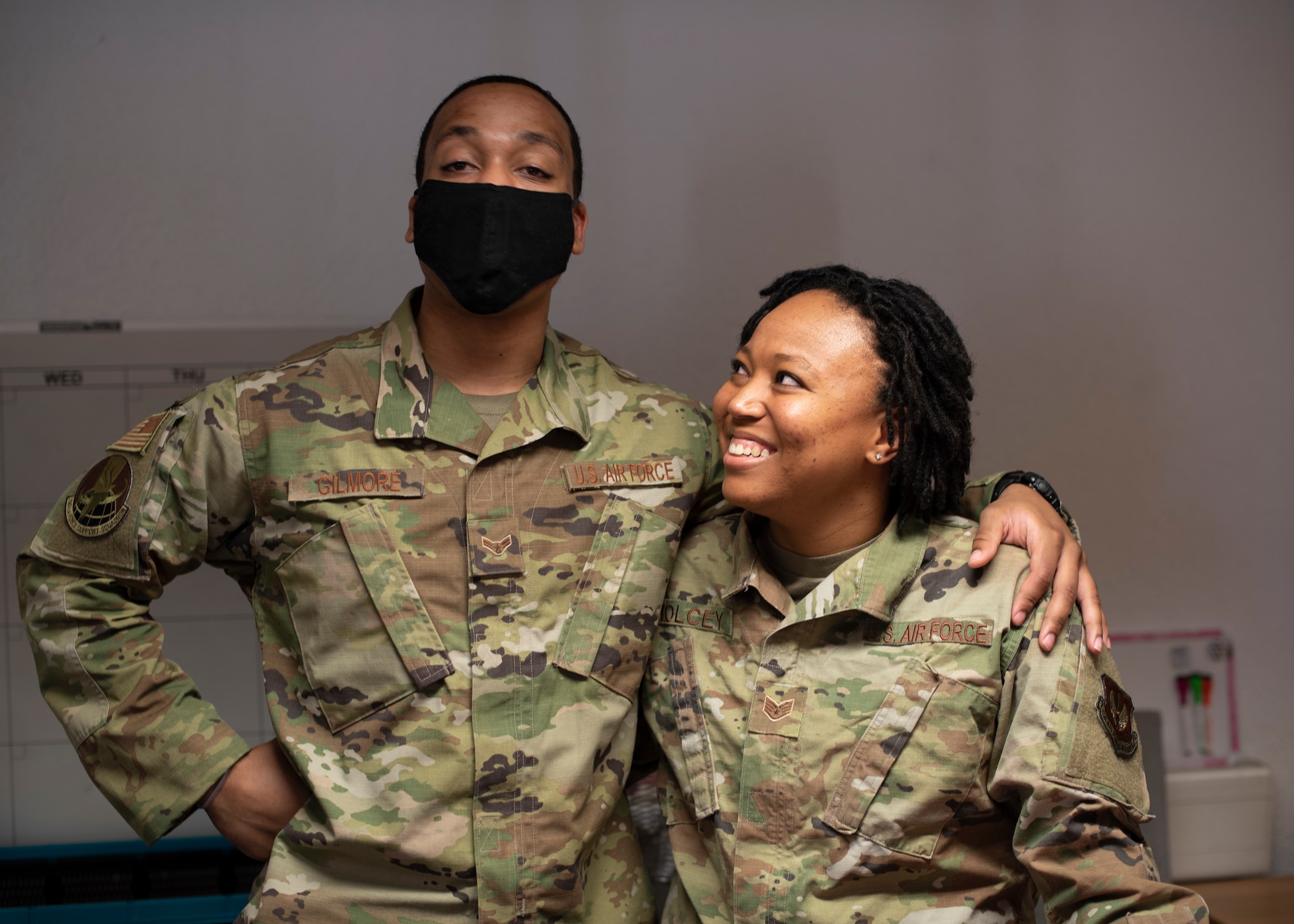 U.S. Air Force Staff Sgt. Jasmine Holcey, right, 786th Force Support Squadron relocations supervisor, poses for a photo with A1C Joshua Gilmore, 786 FSS relocation apprentice, at Ramstein Air Base, Germany, June 1, 2020.