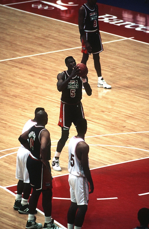 Basketball player prepares to make a free throw.