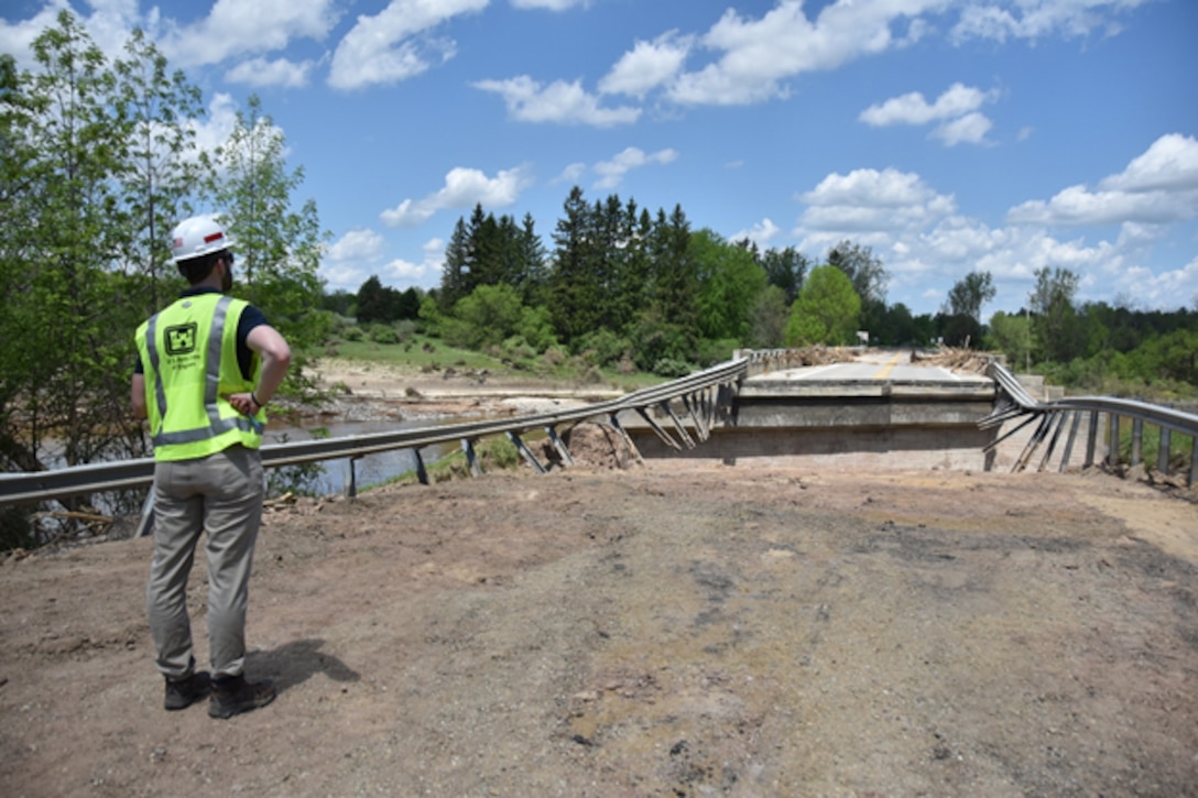 Detroit District Senior Hydraulic Engineer Chris Warren conducts a reconnaissance survey of a State Highway 30 bridge near Edenville, washed out by the east fork of the Tittabawassee River. The U.S. Army Corps of Engineers is providing dam assessment and inundation modeling to the state of Michigan.