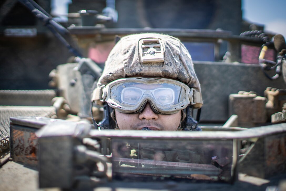 A U.S. Marine sits in an LAV during a field exercise at Marine Corps Base Camp Pendleton, Calif., May 28.