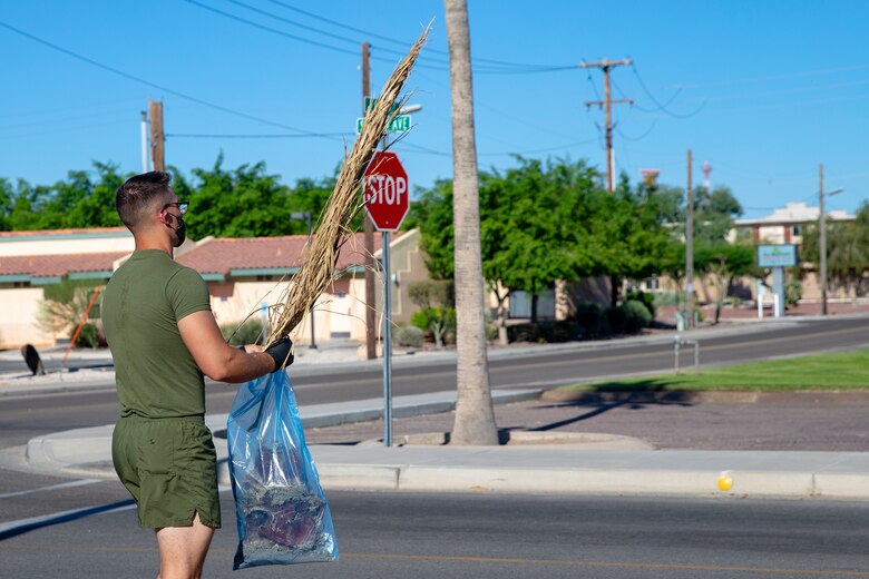 U.S. Marines with Headquarters and Headquarters Squadron (H&HS) conduct a base wide cleanup aboard Marine Corps Air Station (MCAS) Yuma, Ariz., May 27, 2020. The base cleanup was intended to boost unit morale and ensure the cleanliness of MCAS Yuma. (U.S. Marine Corps photo by LCpl Gabrielle Sanders)