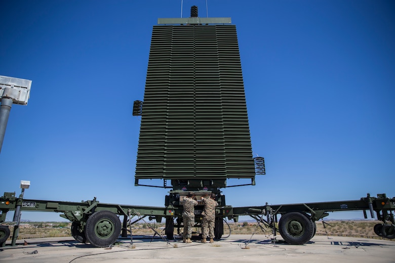 U.S. Marines with Marine Air Control Squadron (MACS) 1, Marine Corps Air Station (MCAS) Yuma, conduct a routine check up on an AN/TPS-59 Radar on Cannon Air Defense Complex, MCAS Yuma April 5, 2020. The AN/TPS-59 Radar is a long-range transportable radar system used to detect and track threats to MAGTF operations. (U.S. Marine Corps Photo by Lance Cpl. John Hall)
