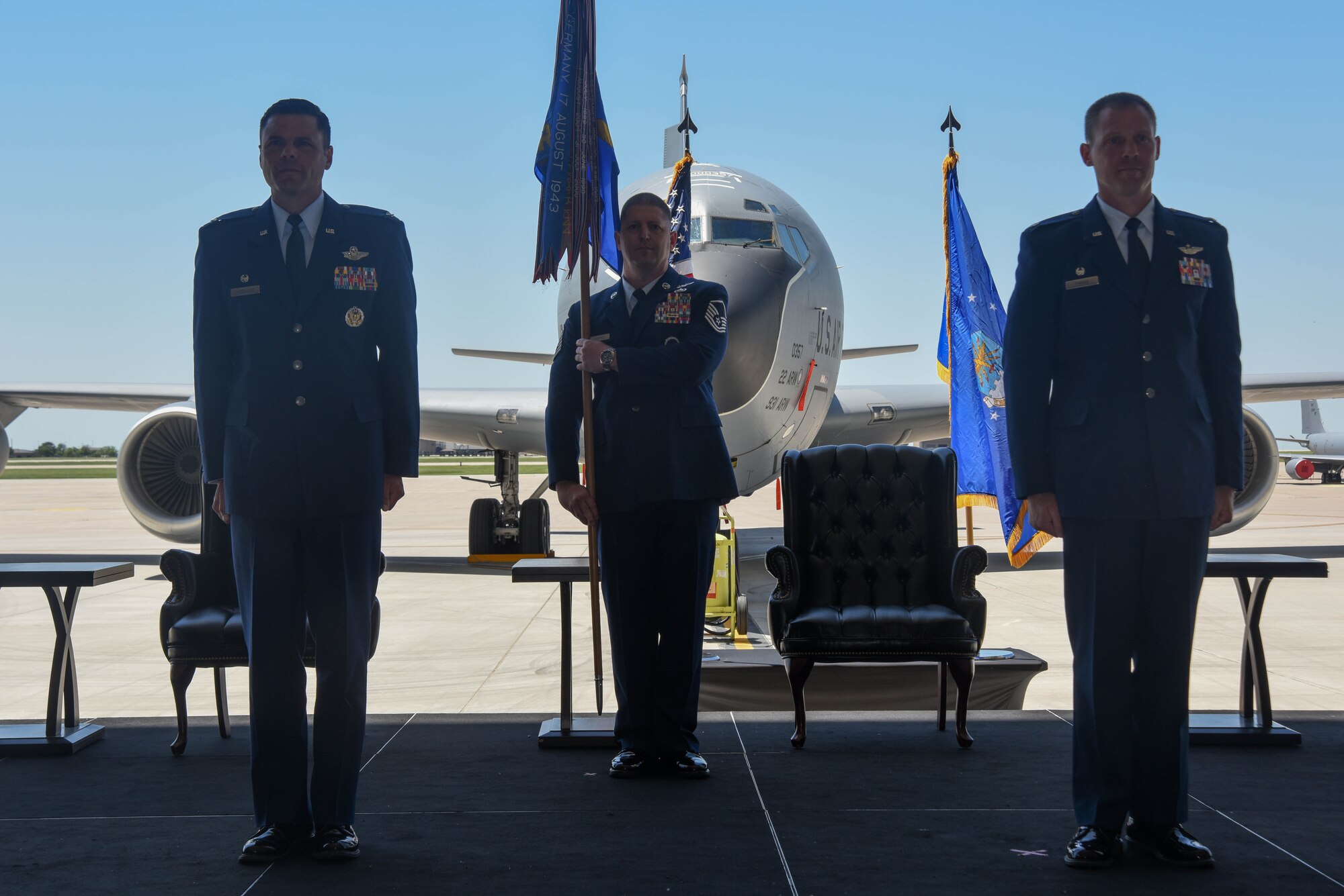Lt. Col. Jacob Parker, 350th Air Refueling Squadron incoming commander, right, assumes command during a change of command ceremony May 29, 2020, at McConnell Air Force Base, Kansas. Parker will ensure the KC-135 Stratotanker will continue to execute air refueling missions during his tenure. (U.S. Air Force photo by Airman 1st Class Marc A. Garcia)
