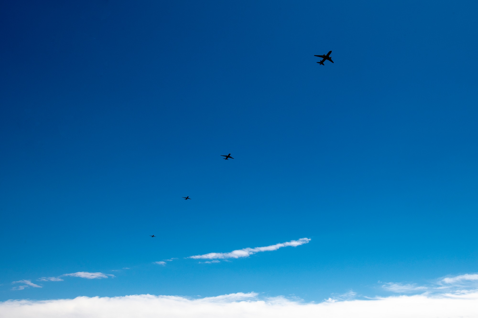 U.S. Air Force KC-46 Pegasus aircraft fly in formation above Altus Air Force Base, Oklahoma, during a large formation exercise, May 21, 2020.