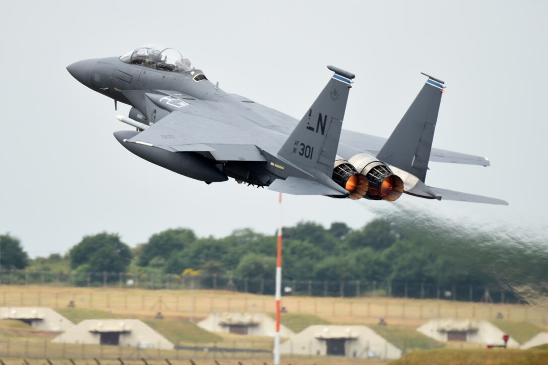 A F-15E Strike Eagle taking off.
