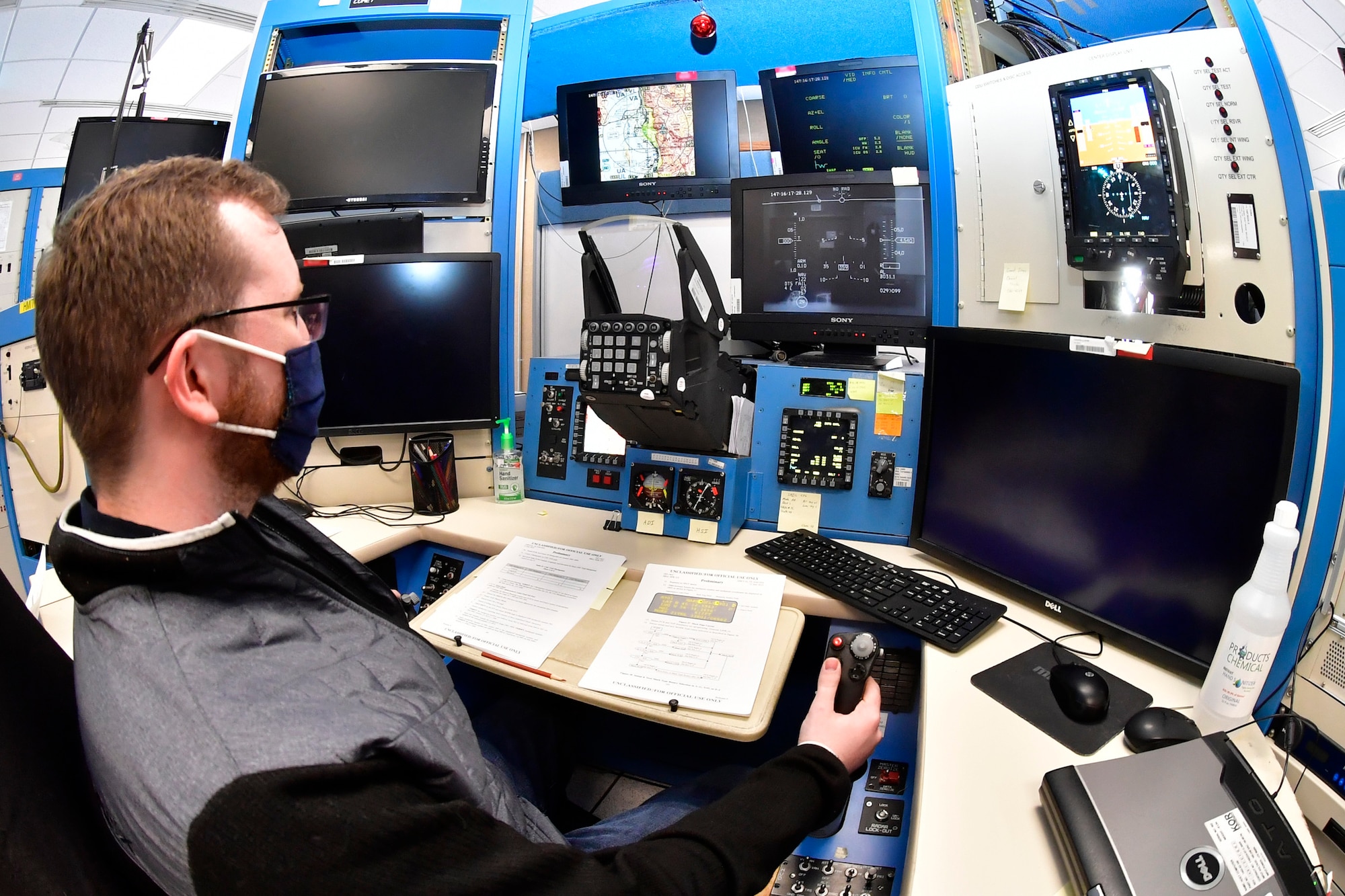 Collin Lindeman, system test engineer in the 518th Software Engineering Squadron, preforms software test and evaluation on an F-16 simulator, May 26, 2020, at Hill Air Force Base, Utah. (U.S Air Force photo by Todd Cromar)