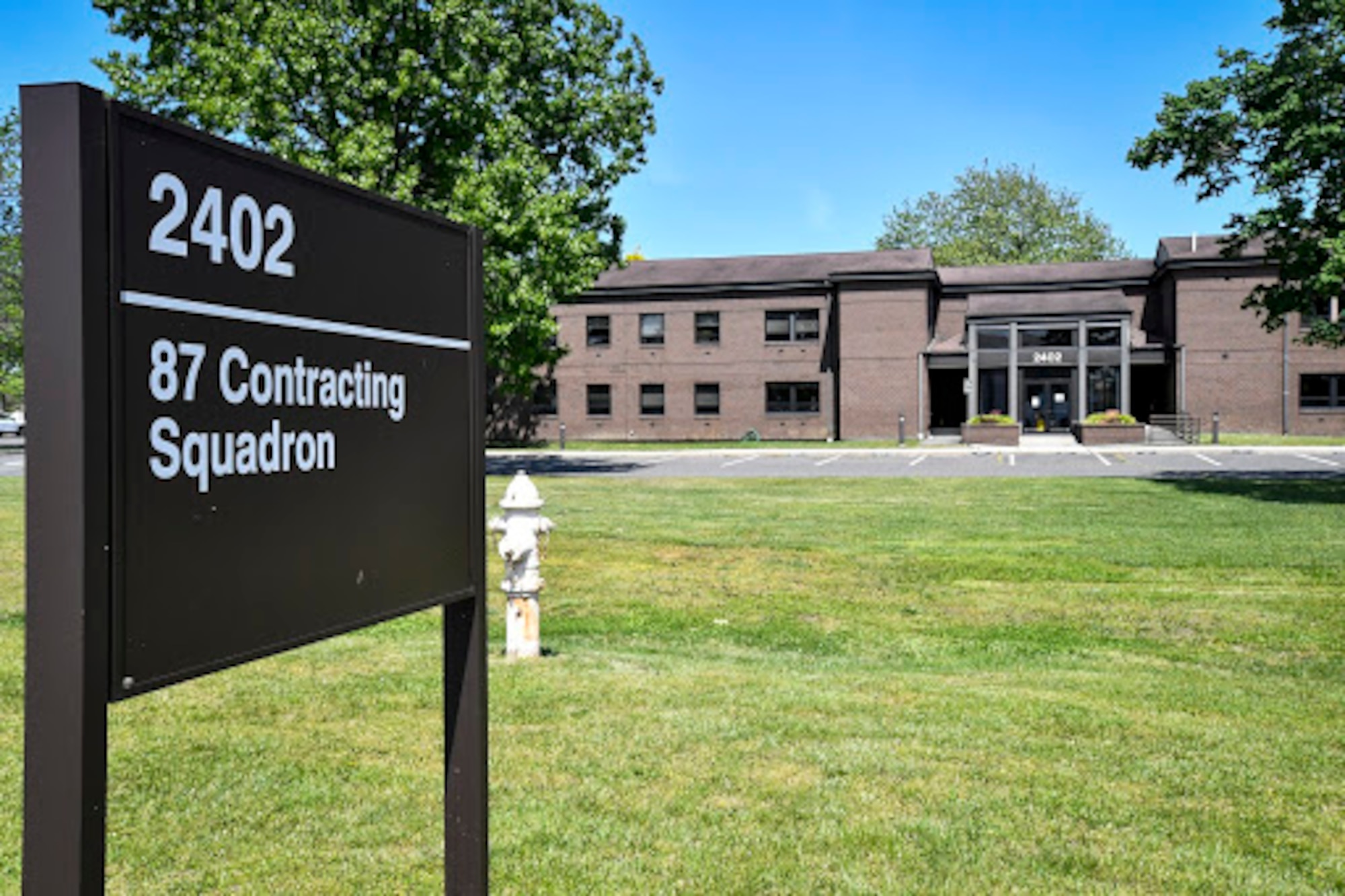 Photo of the 87th Contracting Squadron sign.