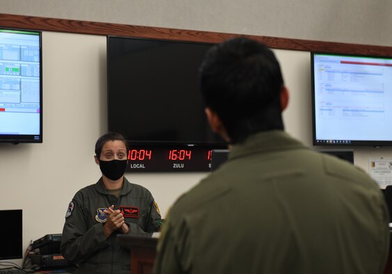 Members of the 34th Bomb Squadron receive a step brief prior to launching from Ellsworth Air Force Base, S.D., May 19, 2020, for a long-range, long-duration Bomber Task Force mission in the U.S. European Command area of responsibility. Flight surgeons help to physically and mentally prepare aviators prior to missions. (U.S. Air Force photo by Airman 1st Class Christina Bennett)