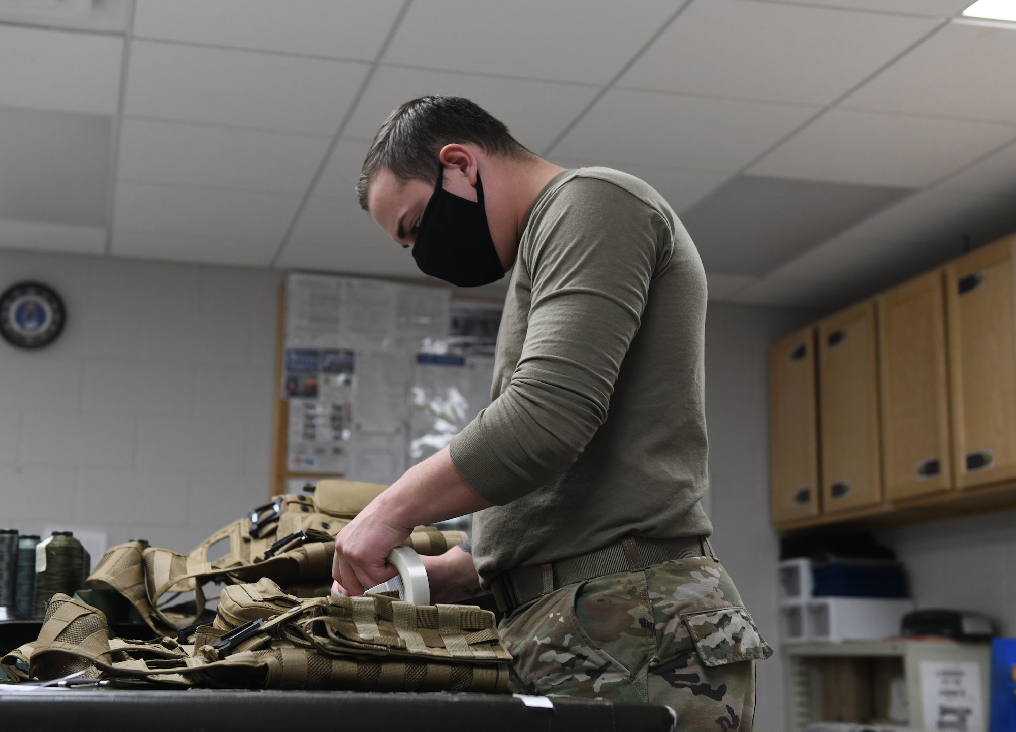 An Airman assigned to the 28th Operations Support Squadron tests equipment for aviators prior to a more than 25-hour non-stop deployment from Ellsworth Air Force Base, S.D., to the U.S. European Command area of responsibility May 4, 2020. In addition to caring for aviators, many flight surgeons serve as occupational medical specialists by monitoring the safety and health of the base population, particularly those who work in hazardous work environments.  (U.S. Air Force photo by Airman 1st Class Christina Bennett)