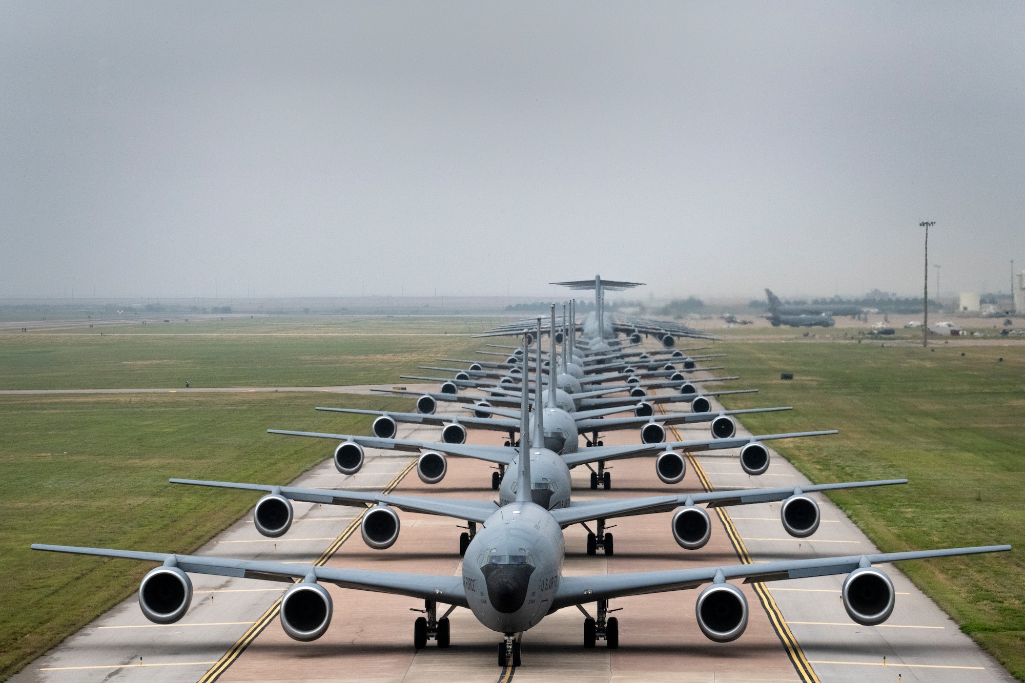 U.S. Air Force KC-135 Stratotankers, C-17 Globemaster IIIs and KC-46 Pegasus aircraft line up for an elephant walk at Altus Air Force Base, Oklahoma, during a large formation exercise, May 21, 2020.