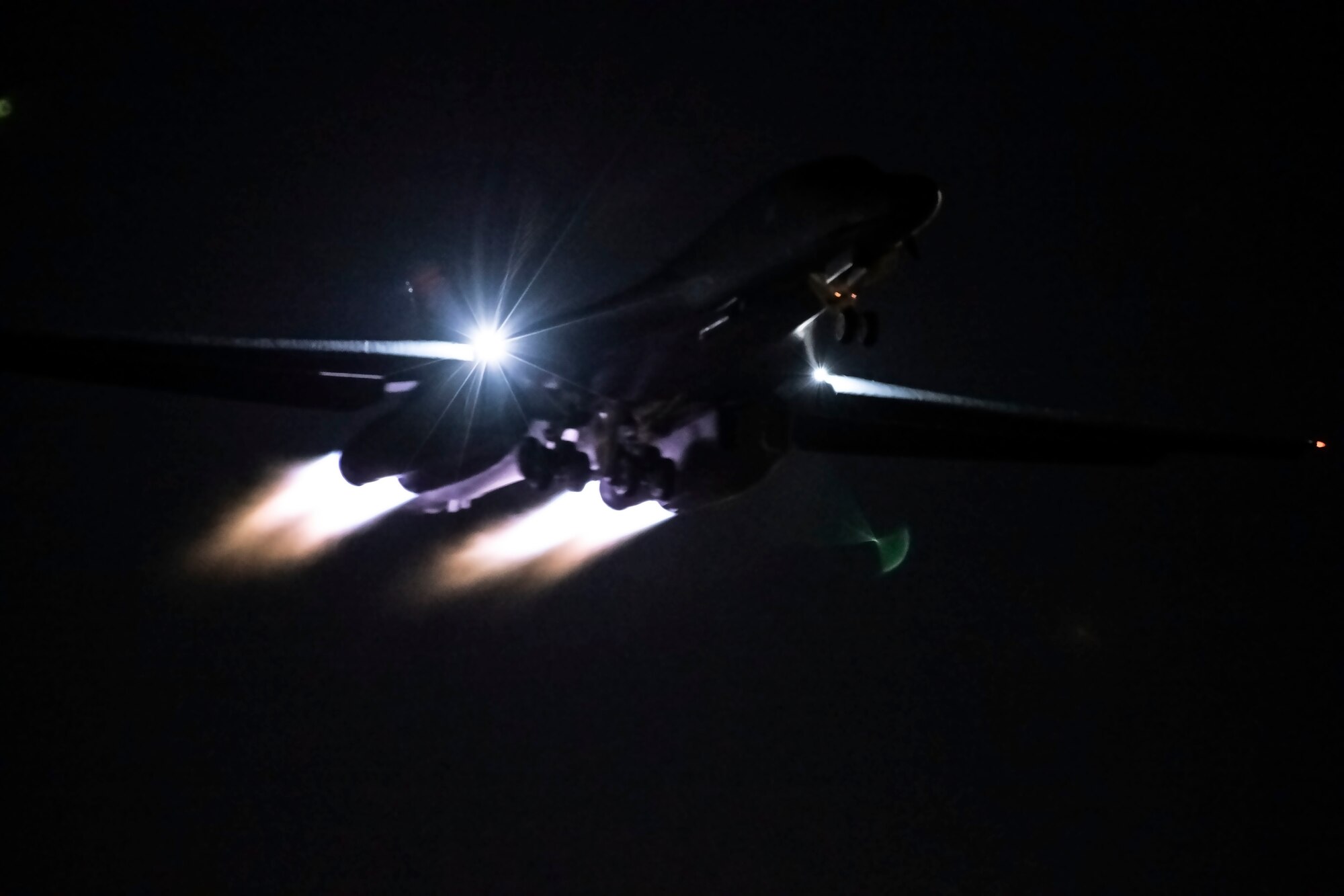 A B-1B Lancer soars through the night sky above Nellis Air Force Base, Nev., during Red Flag 20-1, Jan. 30, 2020. Flight surgeons help to make the mission possible by ensuring that aviators are fit to fly prior to takeoff. (U.S. Air Force photo by Airman 1st Class Christina Bennett)